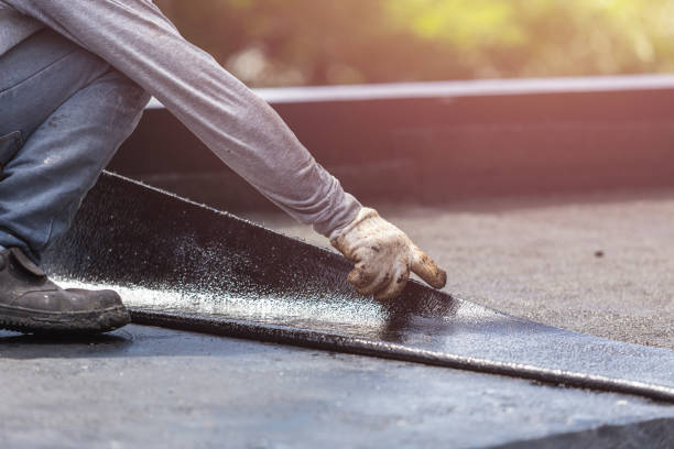 Professional Waterproofing technician working in Leonard, MI